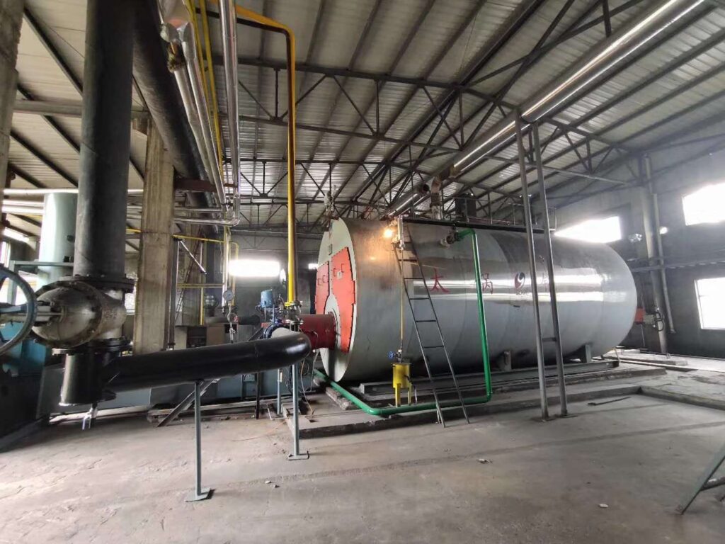  Operational view of Taiguo’s 10t/h WNS series gas-fired steam boiler room supplying a massive fabric finishing facility.